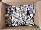 a box full of toothbrushes and toothpaste in it