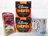 three boxes of disney defis are sitting on a table