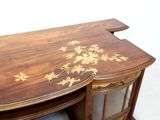 a wooden desk with a floral design on the top
