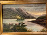 un tableau représentant des vaches paissant au bord d'un lac dans les montagnes