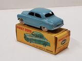 a blue toy car sitting on top of a box