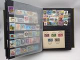 an open book with stamps and stamps on it