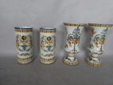 three vases are sitting on a table with a white background