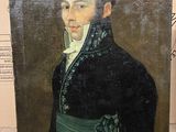 tableau représentant un homme vêtu d'un manteau noir et d'une robe verte