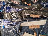 a suitcase full of clothes and other items in it