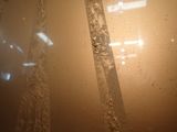 a close up view of a bathroom shower curtain