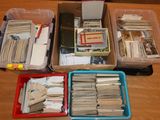 a lot of boxes of books and papers on the table