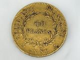 an image of a gold coin on a white surface