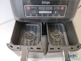 two deep fryers in the bottom of the fryer