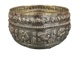an image of a silver bowl with elephants on it on a white background