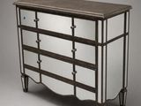 an image of a dresser with mirrored drawers and a wooden top