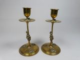 pair of antique brass candlesticks with birds on them