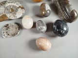 many different types of rocks and stones on the table
