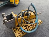 a small machine that is sitting on a pallet