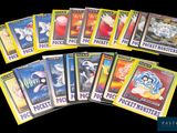 a lot of pokemon trading cards on a black background