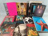 a lot of books that are sitting on a table