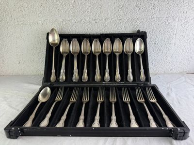 a lot of spoons and forks in a black case
