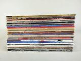 a stack of magazines stacked on top of each other