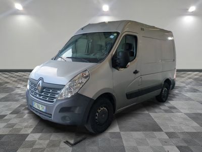 a silver van that is parked on a checkered floor