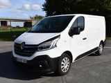 a picture of a white van parked in a parking lot