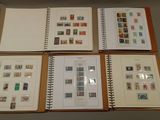 several different types of stamps are displayed in a binder