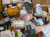 many different types of food and drinks in this box