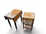two small tables that are sitting next to each other