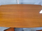 a wooden table with a white paper on it