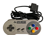 a video game controller that is connected to a charger