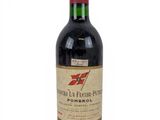 a bottle of wine that is sitting on a table