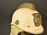 a helmet on a mannequin head with a badge on it