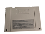 a gameboy game sitting on top of a white table