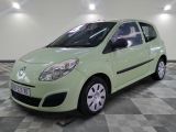a picture of a small green car parked in a garage