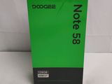 a close up of a green box on a white surface