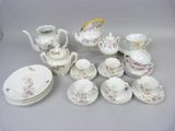 many different types of tea and coffee sets on the table