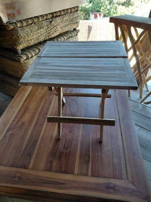 a table that is sitting on a wooden floor