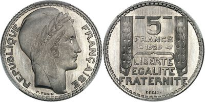 a close up of a coin with a woman ' s face on it