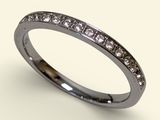 a close up of a diamond ring on a white background