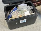 a black suitcase with a bunch of items inside of it