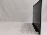 an open laptop computer sitting on top of a white table