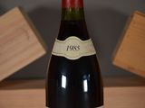 a bottle of wine that is sitting on a table