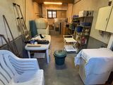 an image of a room with a lot of furniture in it