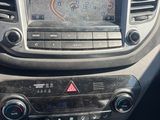 the dashboard of a car with a gps device in the center