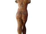 statue of a woman standing on a rock on a white background