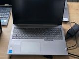 two laptops that are sitting on a table
