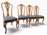 set of four antique dining chairs with blue upholstered upholstered cushions