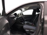 the interior of a car with the door open showing the driver ' s seat