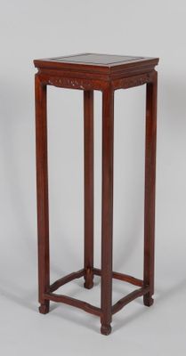 an image of a small wooden table with a marble top