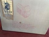 a cardboard box with a picture of a dog on it