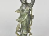 pair of bronze figurines of a woman and a child